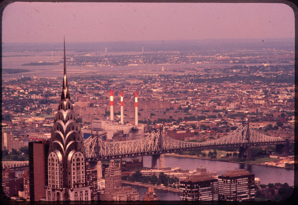 A vintage-toned view of the Chrysler Building above the East River